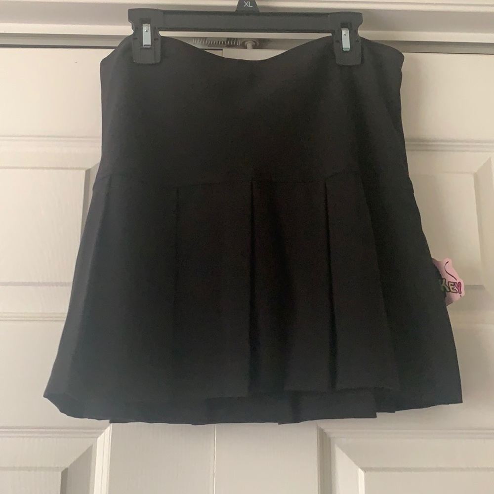 Black short shirt in size 16, brand is Copper Key.